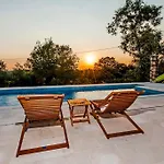 Childern And Adults Enjoy Games,Pool And Seaview