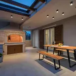 Ferienhaus In Pomer Mit Parkplatz